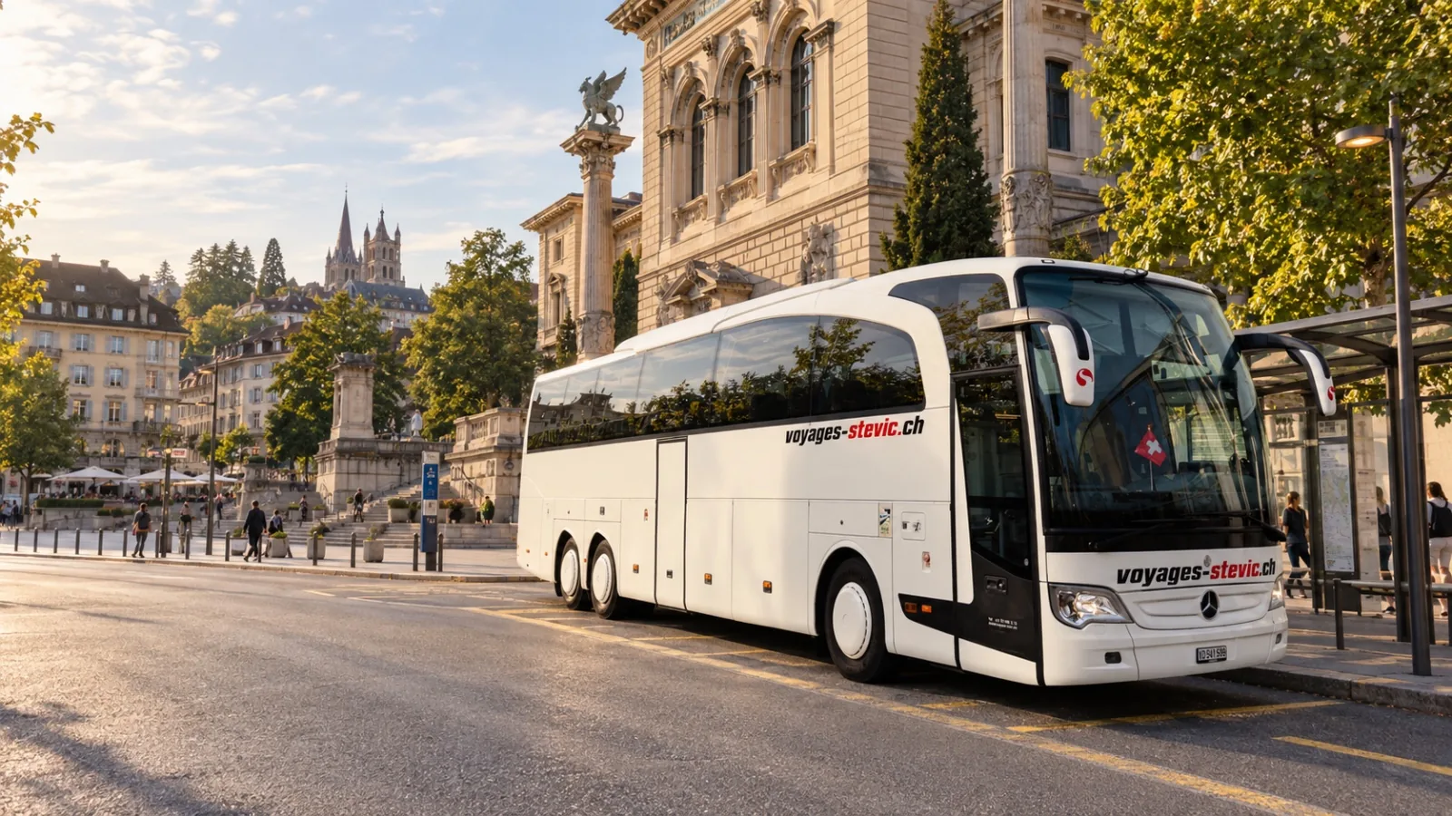 Voyages Stevic Sàrl Mercedes-Benz Travego coach on a lakeside avenue in Lausanne