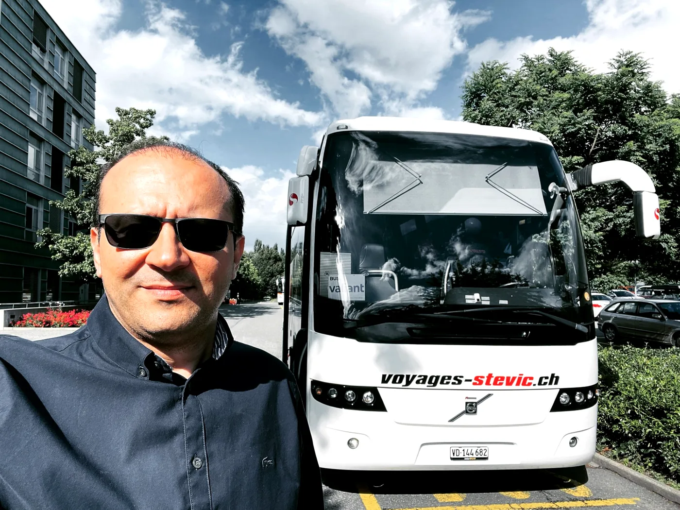 Ivan Stevic, owner of Voyages Stevic Sàrl, in front of one of his coaches