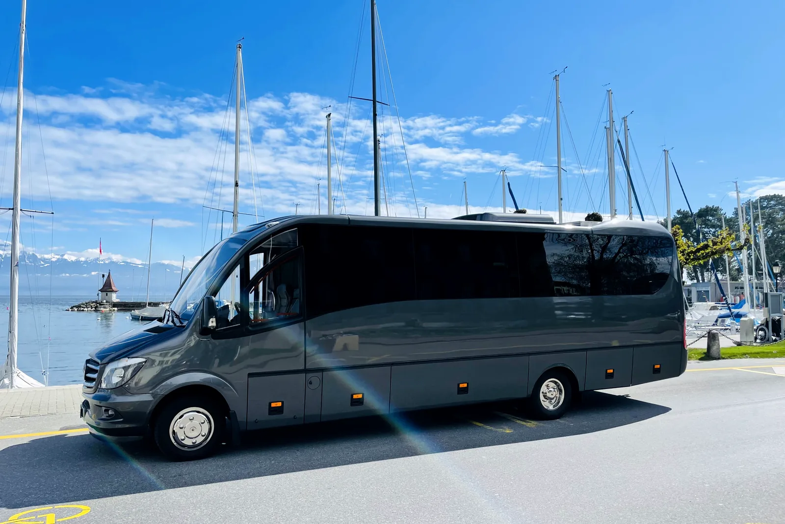 Voyages Stevic Sàrl Mercedes-Benz Dyparro minicoach on the quays of Morges